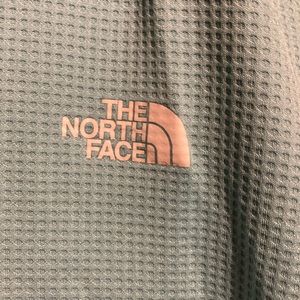 Womens teal North Face polo shirt